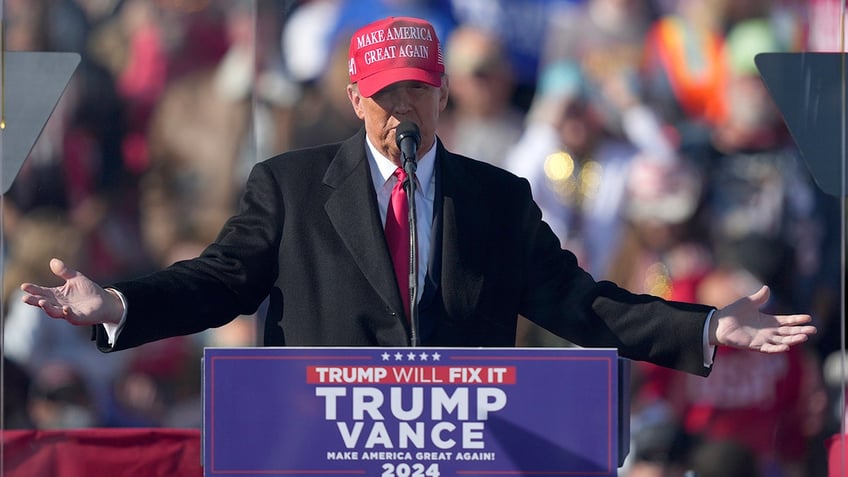 Trump in Pennsylvania with red hat on 