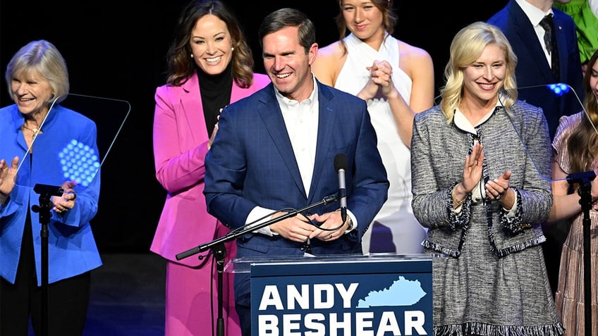 Andy Beshear with supporters on election night