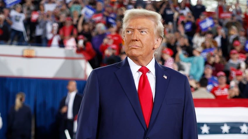 Republican presidential nominee, former U.S. President Donald Trump takes the stage during a campaign rally at the J.S. Dorton Arena on Nov. 4, 2024 in Raleigh, North Carolina. 