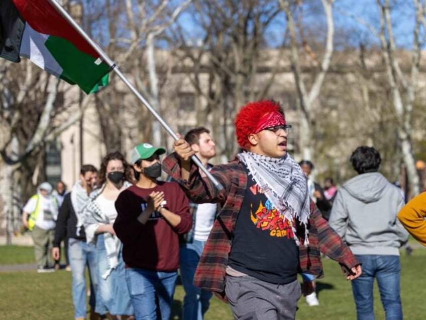 CAMBRIDGE, MASSACHUSETTS - APRIL 22: Students from Massachusetts of Technology, Harvard Un