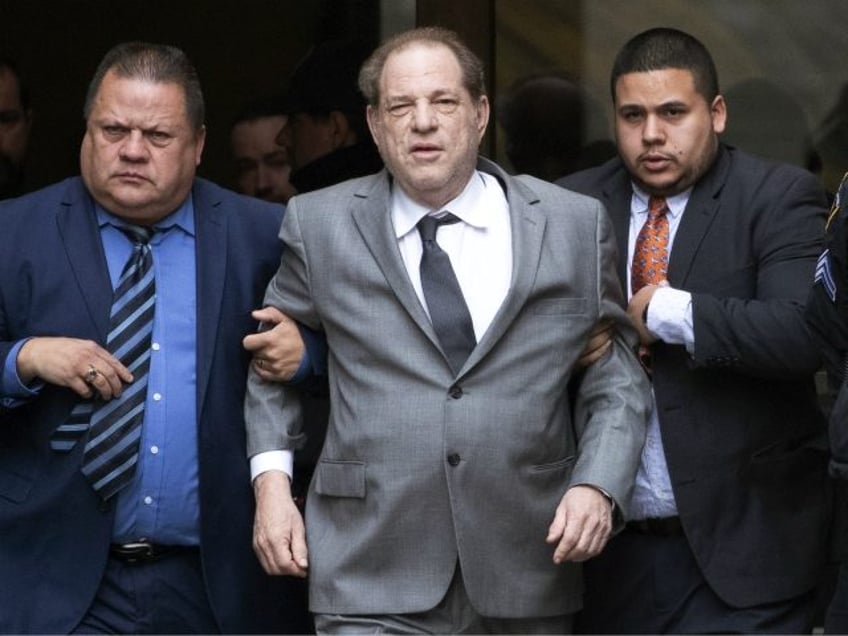 Harvey Weinstein, center, leaves court following a bail hearing, Friday, Dec. 6, 2019 in N