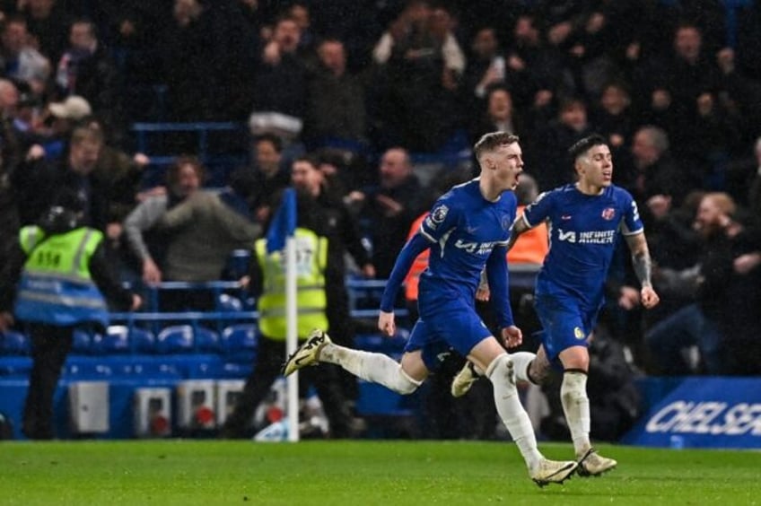 Chelsea's Cole Palmer (left) celebrates after scoring the winning goal against Manchester