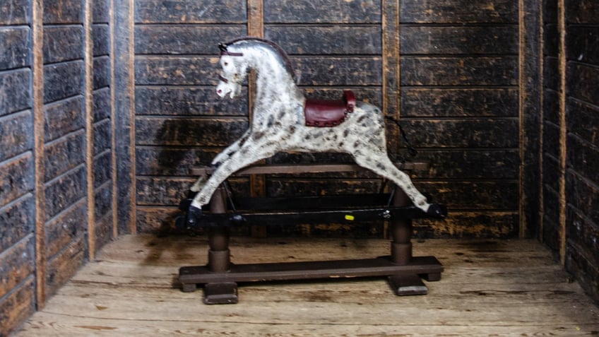 haunted rocking horse that reportedly moved from room to room on its own is going up for sale