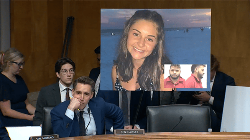 Sen. Josh Hawley (R-MO) with image of Laken Riley behind him