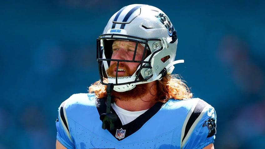 hayden hurst not shocked panthers fired frank reich amid disastrous season discusses how team moves forward