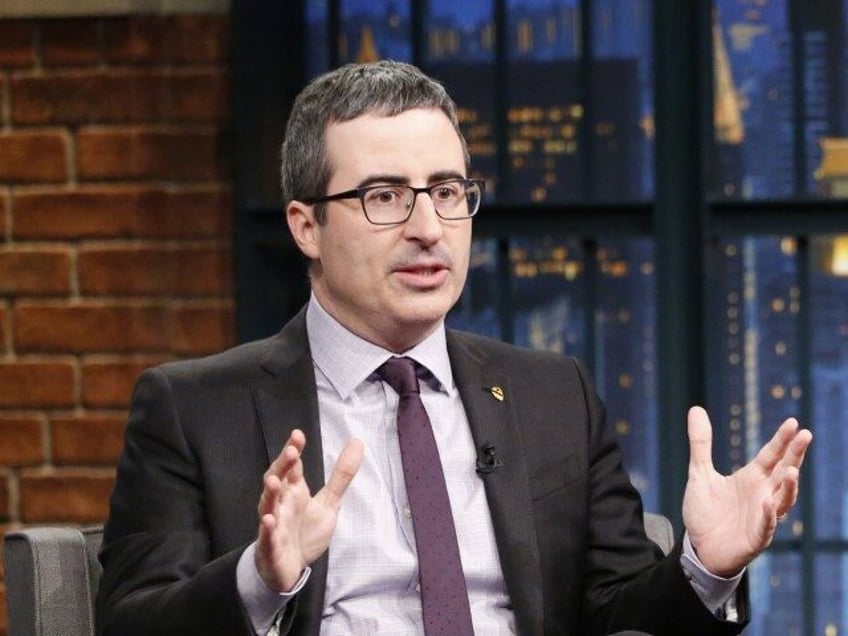 LATE NIGHT WITH SETH MEYERS -- Episode 488 -- Pictured: (l-r) Last Week Tonight host,