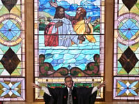 He feared coming out. Now this pastor wants to help Black churches become as welcoming as his own