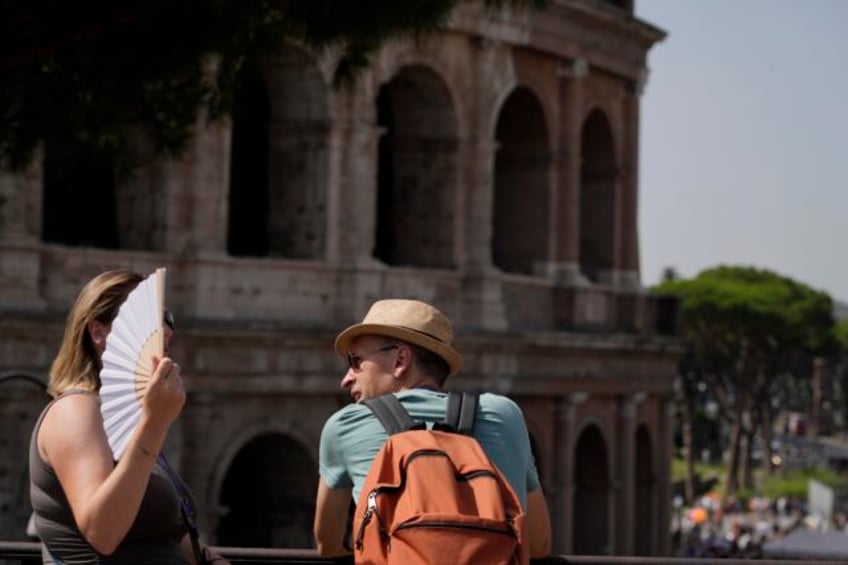 heat wave bakes southern europe sparking warnings to stay inside drink water and limit exercise