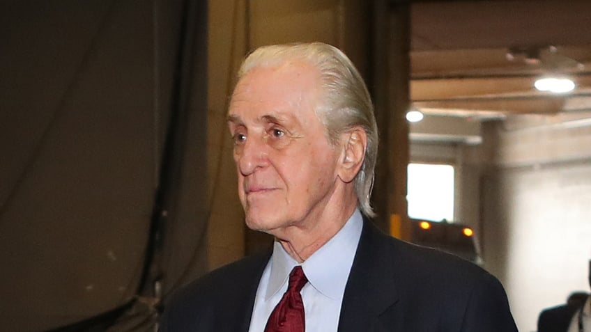 Pat Riley walks into arena