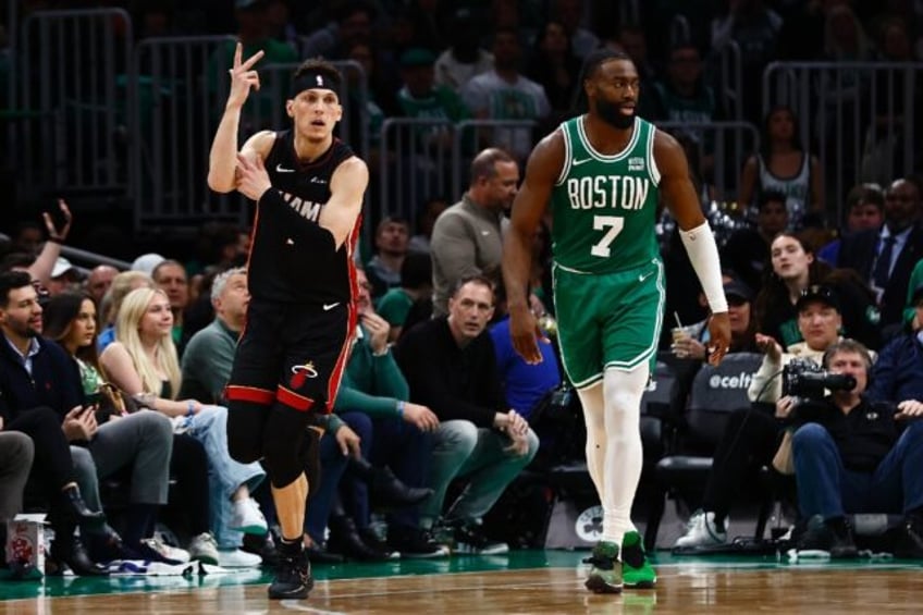 Tyler Herro celebrates a three-pointer in Miami's upset victory over Boston in the NBA pla