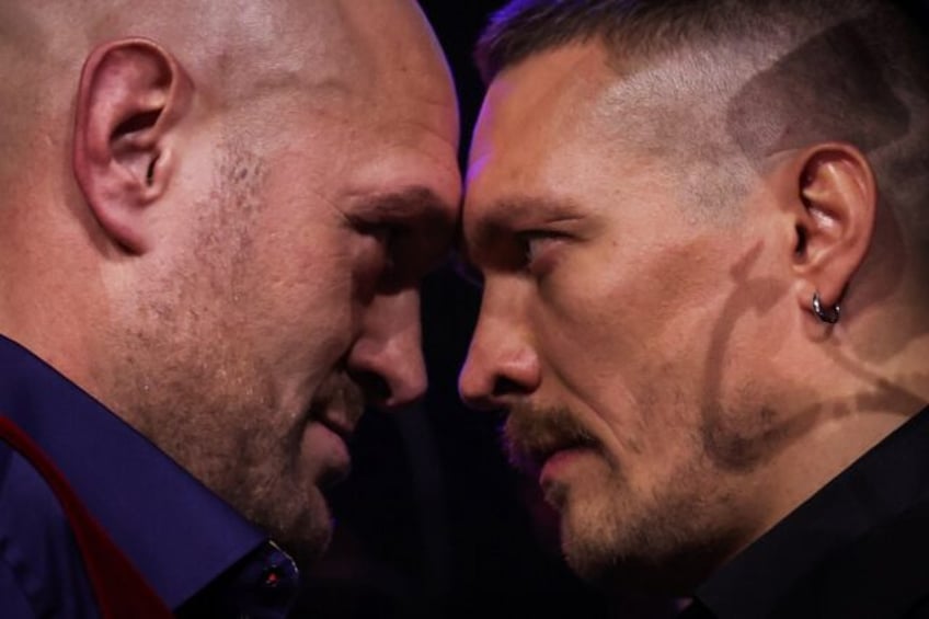 Britain's Tyson Fury (L) and Ukraine's Oleksandr Usyk (R)