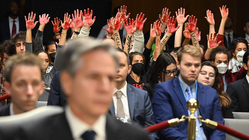 hecklers scream at blinken for israel hamas ceasefire during senate hearing where is your pride america