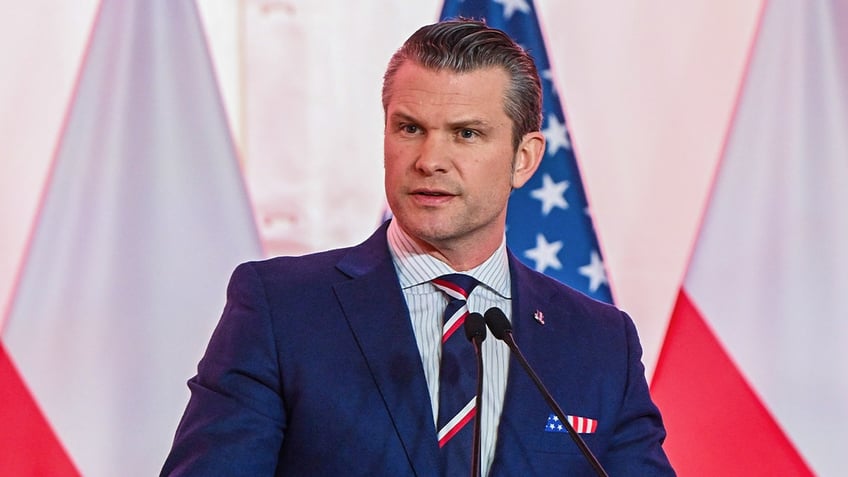 Defense Secretary Pete Hegseth speaks at a press conference in Poland