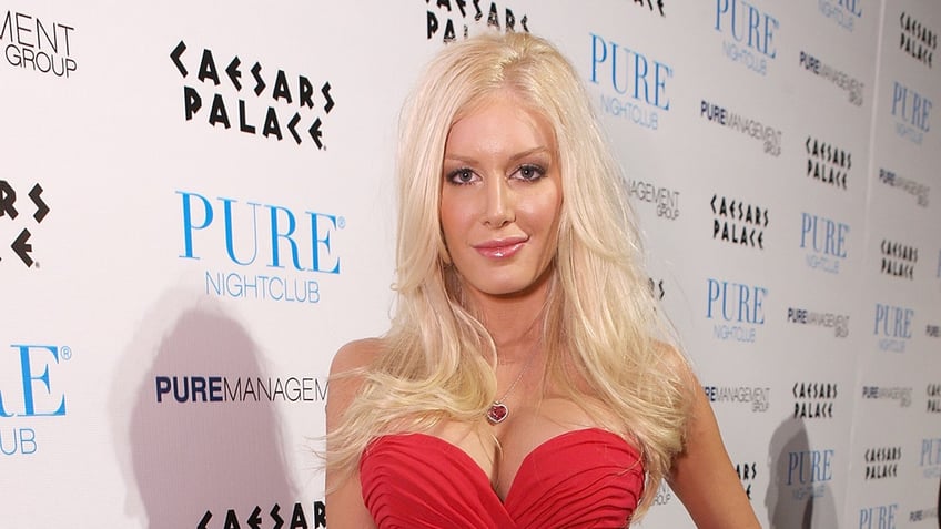 heidi montag had part of her chin sawed off and died basically while getting 10 cosmetic surgeries at once