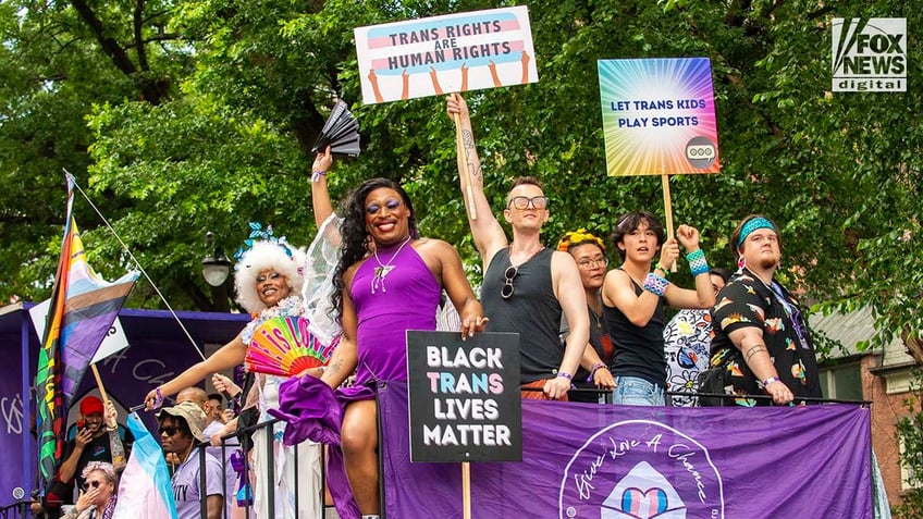 Individuals march in New York City’s annual Pride Parade