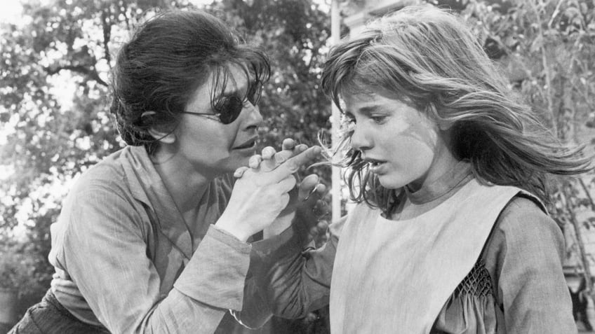Anne Bancroft and Patty Duke in a scene from the 1962 movie 'The Miracle Worker.'