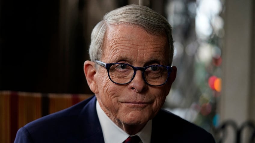 Ohio Gov. Mike DeWine speaks with the AP