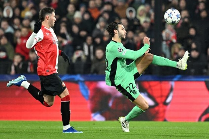 hermoso wondergoal fires atletico into champions league last 16