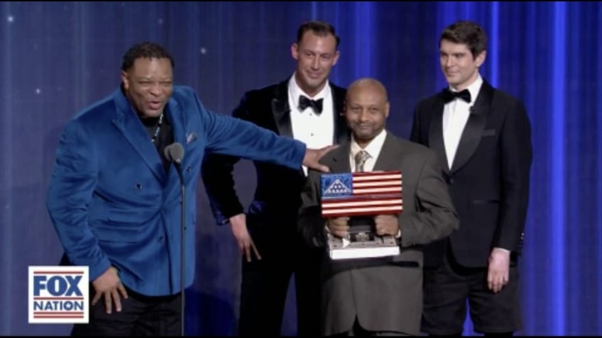 Deacon Clarence McCallister is recognized for his bravery at the Fox Nation Patriot Awards, alongside the pastor he saved.