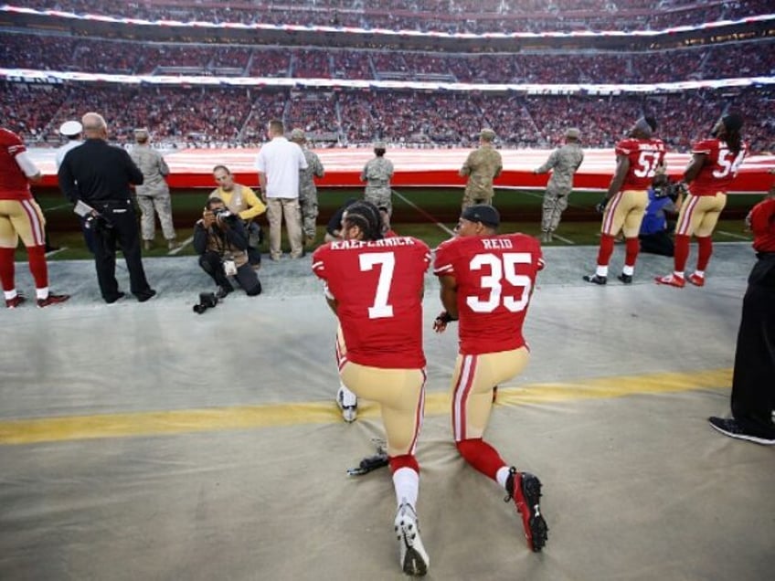 SANTA CLARA, CA - SEPTEMBER 12: Eric Reid #35 and Colin Kaepernick #7 of the San Francisco