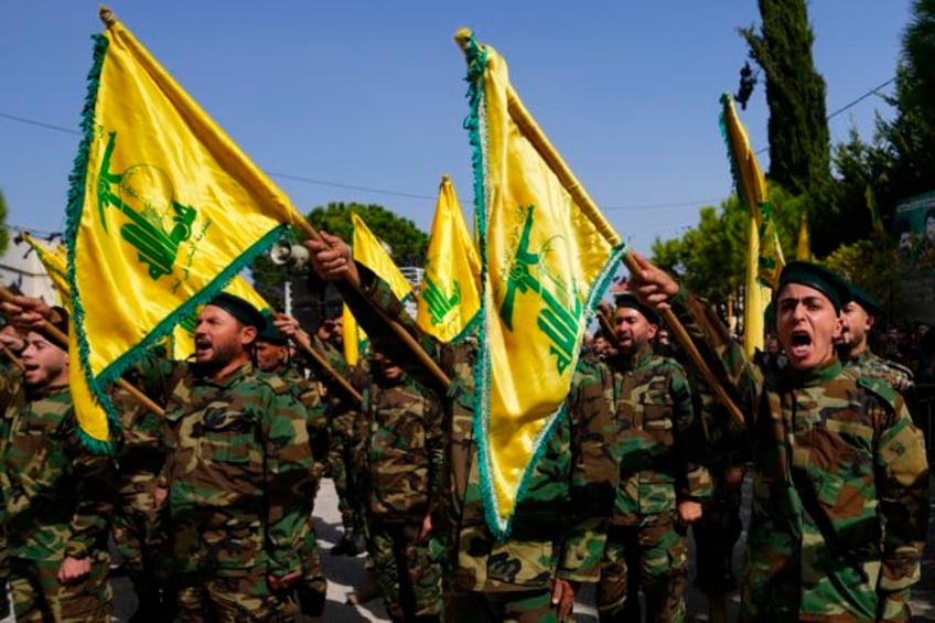 hezbollah and israel exchange fire and warnings of a widened war