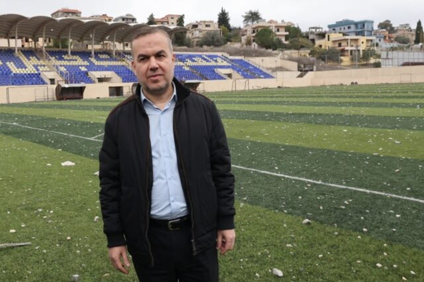 Hezbollah lawmaker Hassan Fadlallah visits the Lebanese border town of Bint Jbeil after a