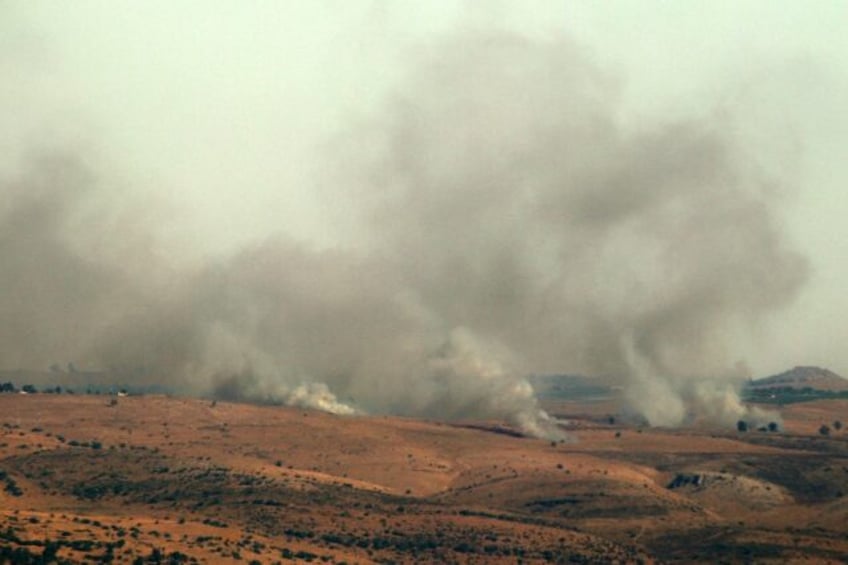 A picture taken from the southern Lebanese area of Marjayoun on July 3, 2024 shows smoke b