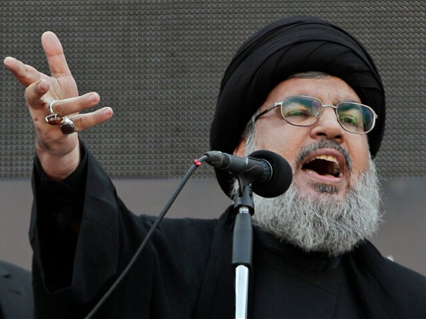 FILE - Hezbollah leader Sheik Hassan Nasrallah, speaks to the crowd in a rare public appea