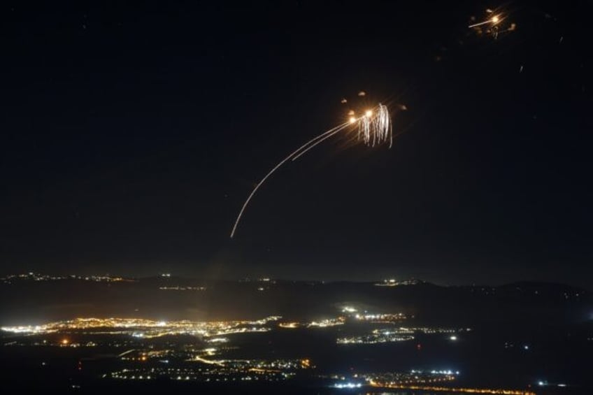 Rockets fired from Lebanon are intercepted by Israel's Iron Dome air defence system