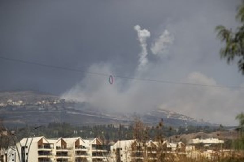 Hezbollah rockets kill at least 7 in Israel as Lebanese PM says cease-fire could come soon