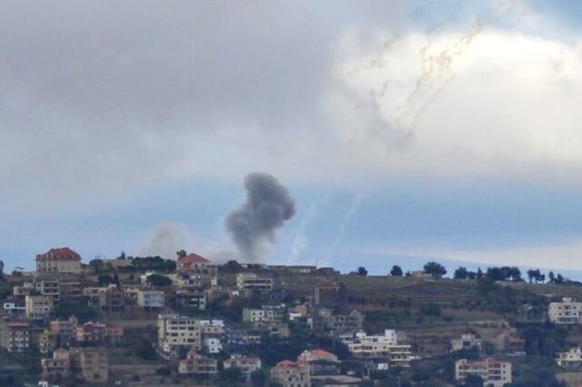 Smoke billows over the south Lebanon village of Khiam after an Israeli bombardment