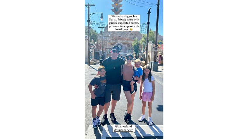 Tarek El Moussa and Heather Rae at Disneyland with kids