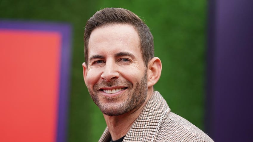 Tarek El Moussa smiling