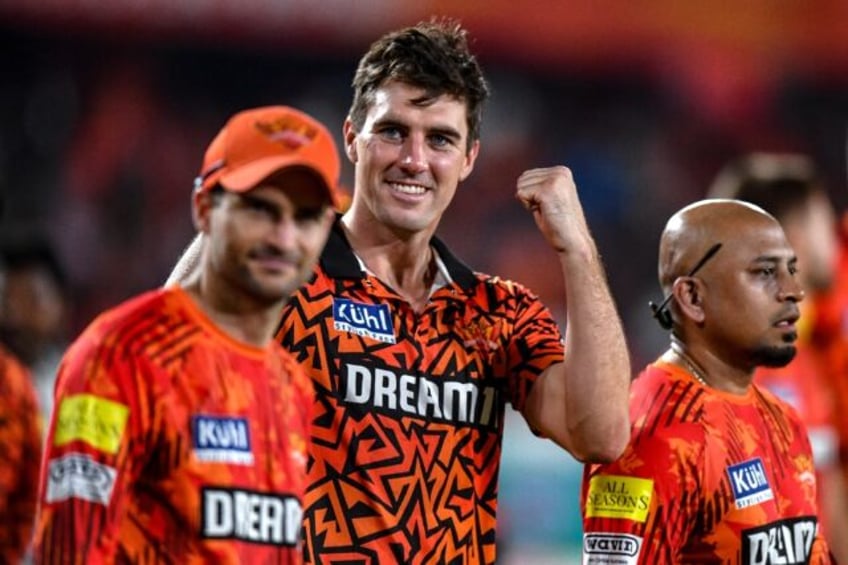 Sunrisers Hyderabad captain Pat Cummins (centre) celebrates victory over Punjab Kings on S