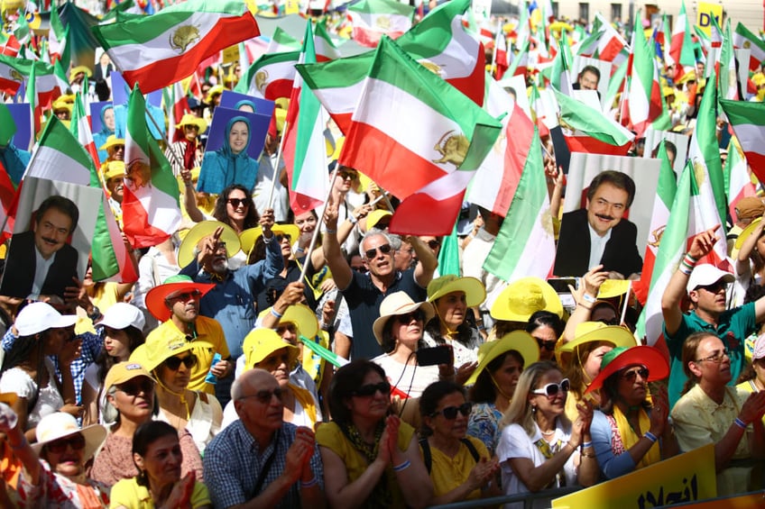 high profile free iran summit sees global leaders convene in support of iranian resistance we must liberate iran