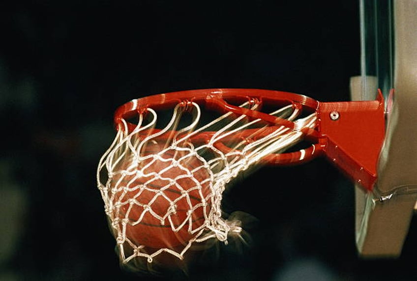 basketball, ball going through hoop, close-up (blurred motion) - basketball hoop stock pictures, royalty-free photos & images