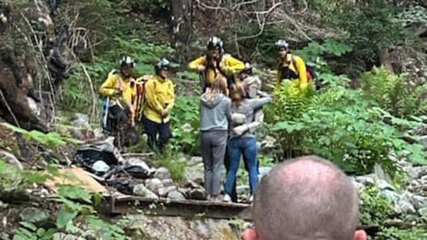 Lukas McClish hugging family