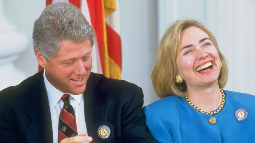 Bill and Hillary Clinton laughing