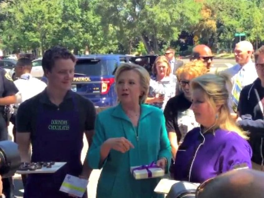 hillary clinton refuses questions offers candy to the press after anti breitbart speech