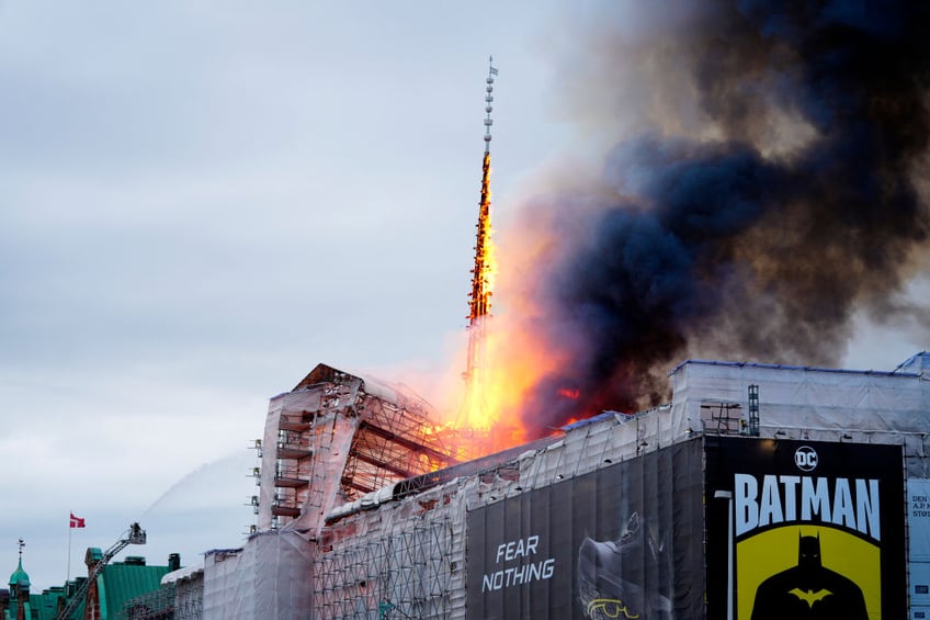 historic artworks rushed into streets as one of copenhagens oldest buildings burns