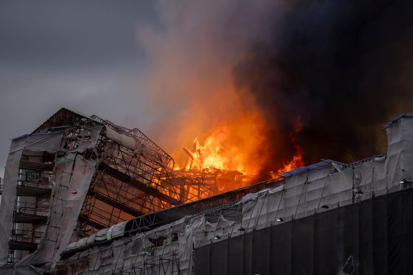 historic artworks rushed into streets as one of copenhagens oldest buildings burns