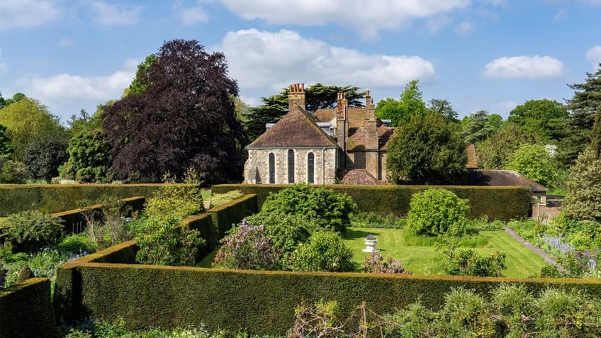 View of chapel and gardens at property