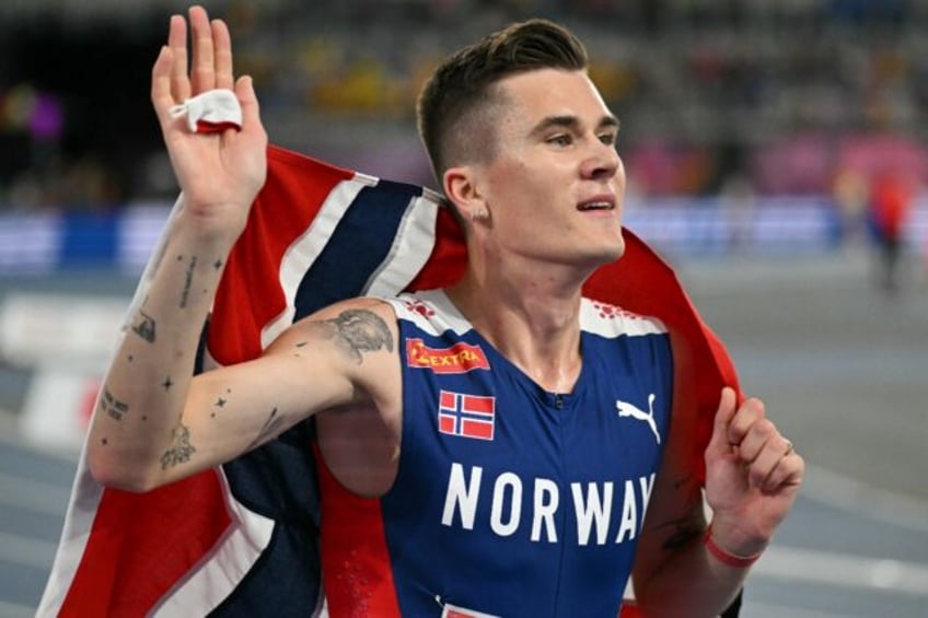 Champion: Norway's Jakob Ingebrigtsen celebrates winning the men's 1500m final