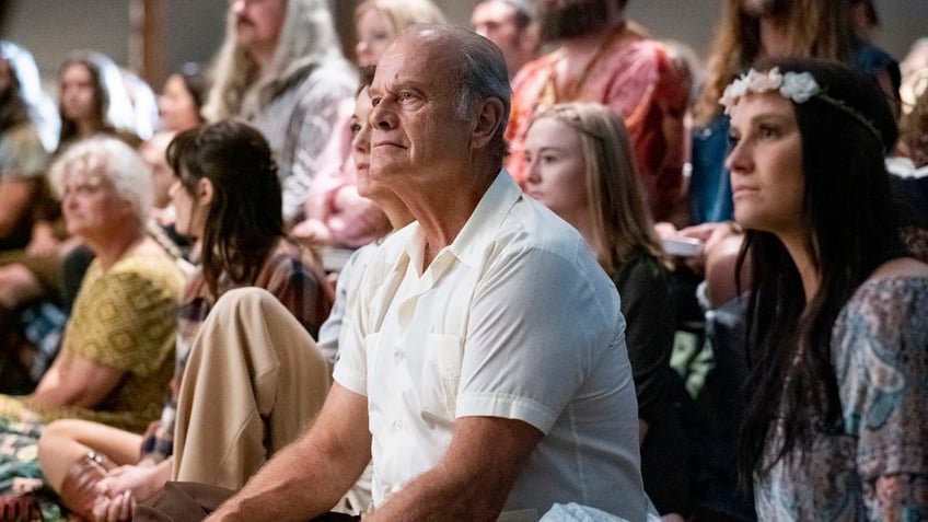 Kelsey Grammer sits with congregation in Jesus Revolution