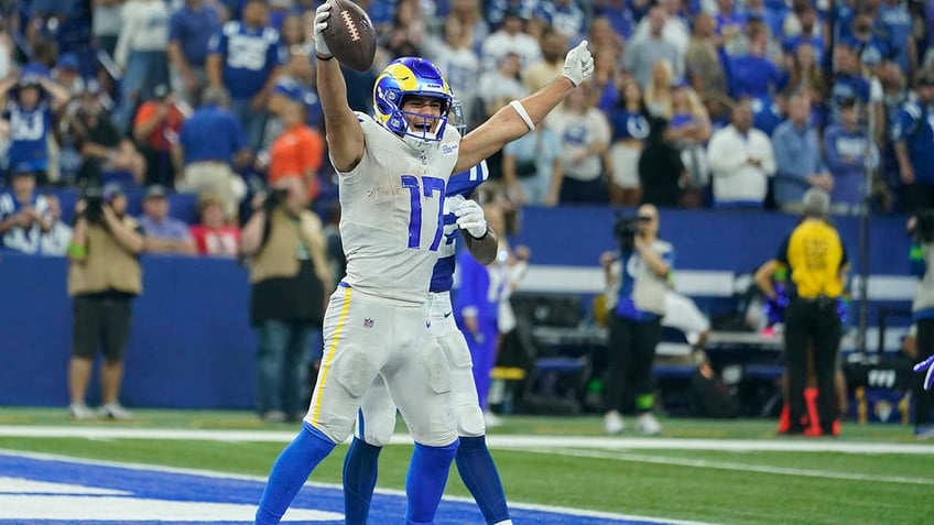 hobbled matthew stafford finds puka nacua to give rams victory over colts in ot