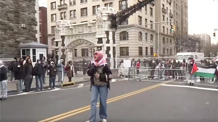 Protesters gathered outside the City University of New York.