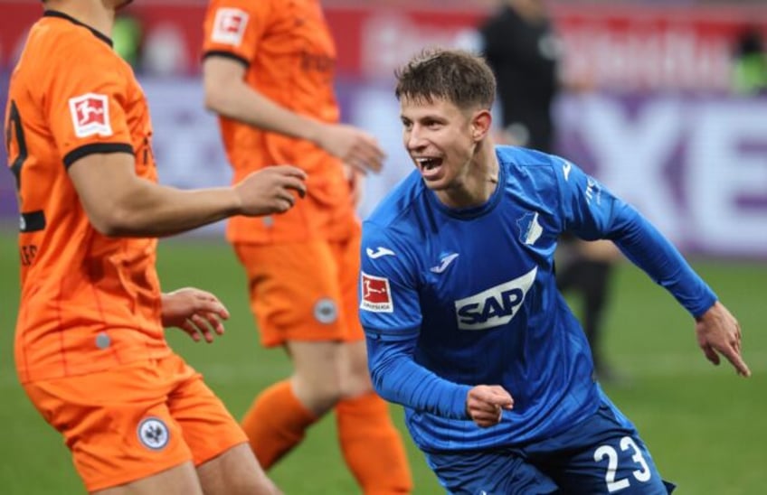 Hoffenheim forward Adam Hlozek celebrates after scoring in added time to secure a 2-2 draw