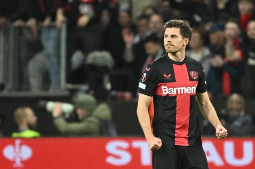 On target: Bayer Leverkusen's Jonas Hofmann celebrates scoring the opening goal