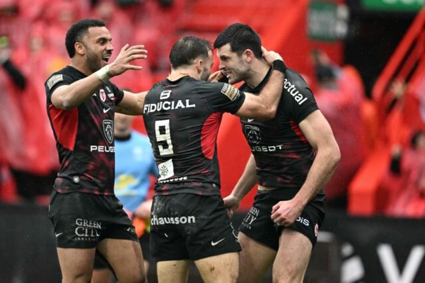 Blair Kinghorn (R) scored one of Toulouse's three tries against Montpellier