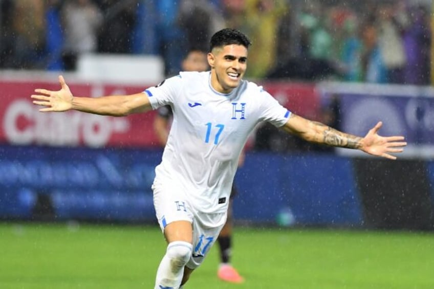 Honduras forward Luis Palma celebrates after scoring his team's second goal in a 2-0 win o